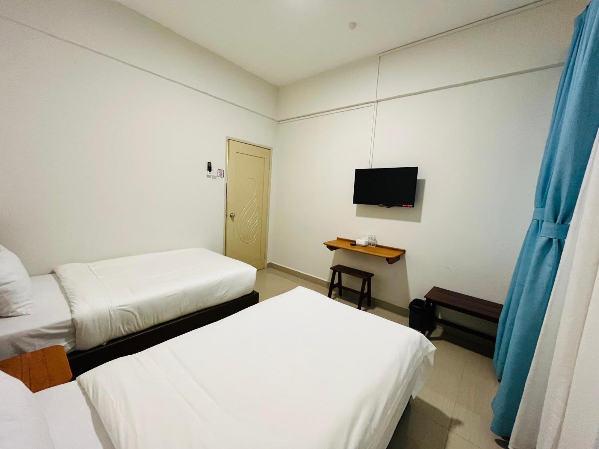 Alexis Kt Roomstay 쿠알라트렝가누 객실 사진