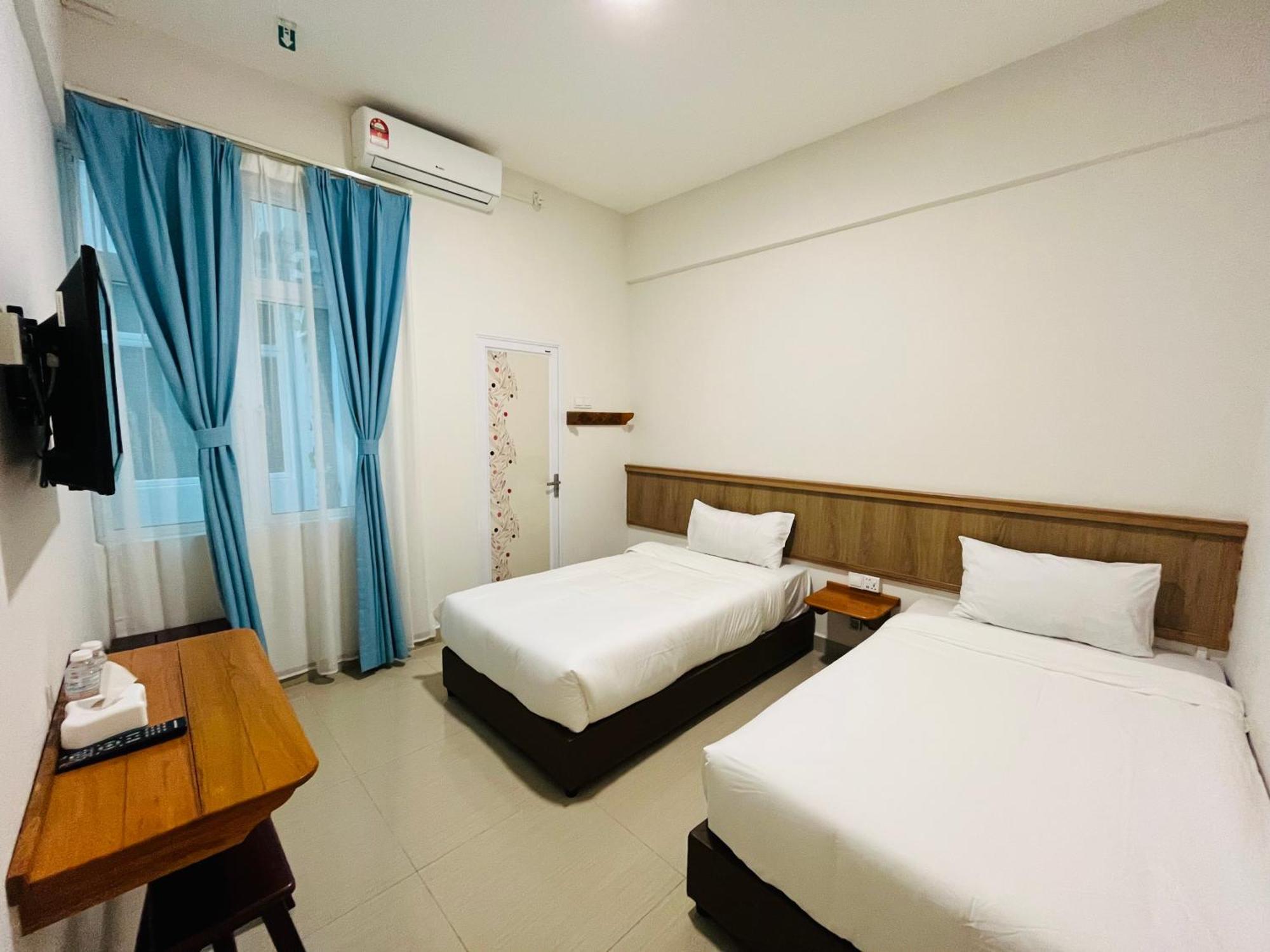 Alexis Kt Roomstay 쿠알라트렝가누 객실 사진