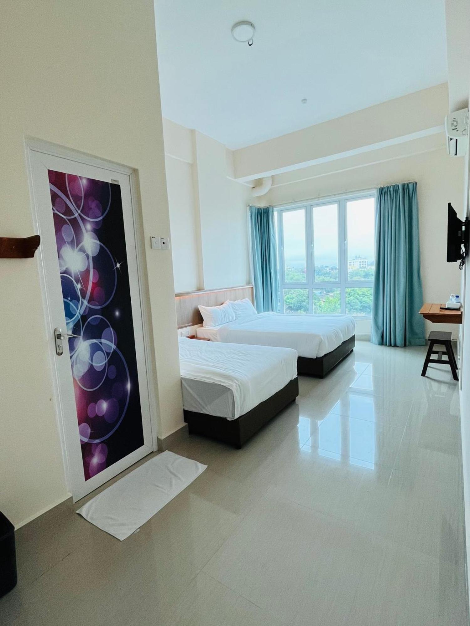 Alexis Kt Roomstay 쿠알라트렝가누 객실 사진